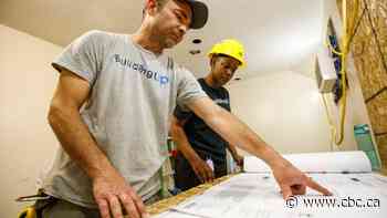 Homes in need of retrofitting provide training ground for green construction workers