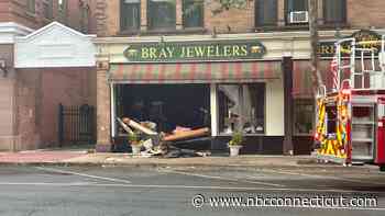 Vehicle crashes into Manchester jewelry store