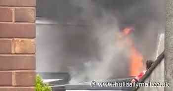 Blaze behind Hull house spreads to nearby buildings as residents try to put it out