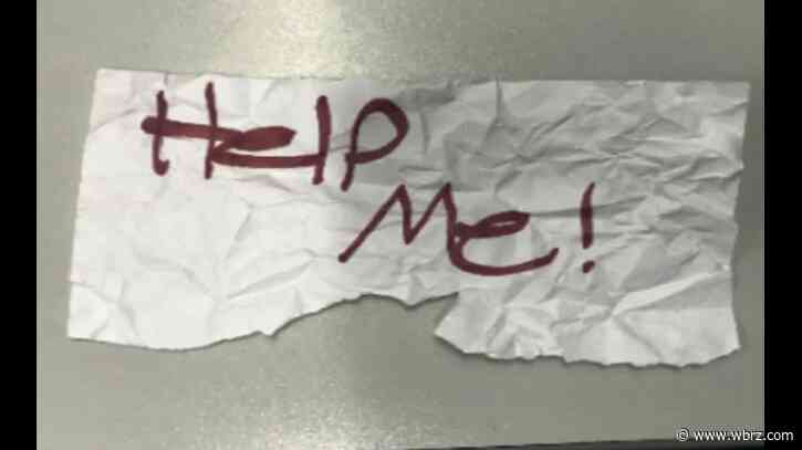 'Help me' sign leads to rescue of kidnapped Texas girl in Southern California