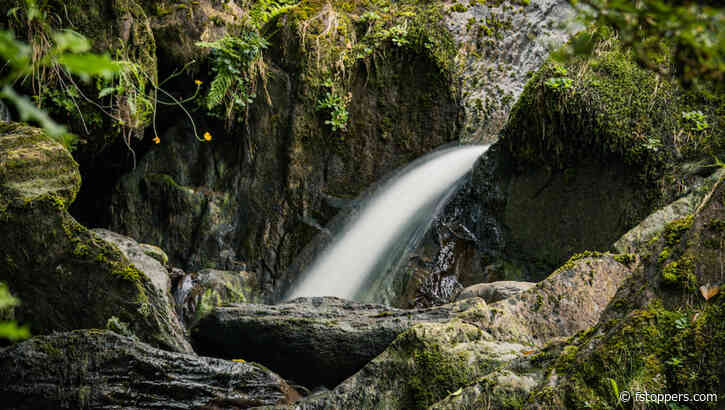 Capturing the Beauty: Enhancing Your Photography Skills With a Telephoto Lens for Small Waterfalls