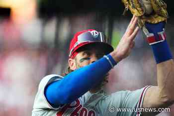 Phillies Star Bryce Harper Makes Catch Tumbling Into Photo Pit in First Career Start at First Base