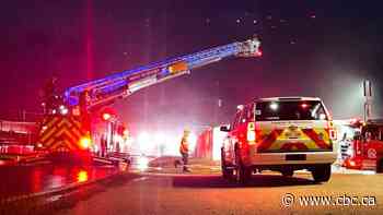Crews fight Friday night fire at Jarvis Avenue warehouse