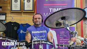 Lisburn man sets drumming world record in memory of partner