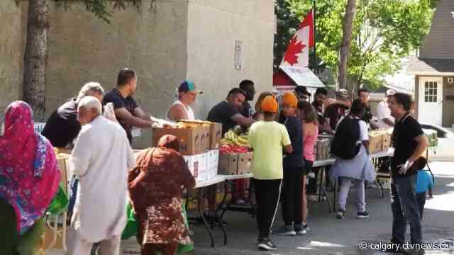 As financial pressures grow, Calgary's Love With Humanity Association distributes free produce, fruit