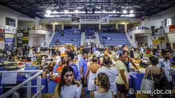 Wildfires force locals, tourists to evacuate Greek islands