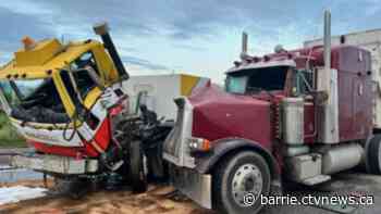 Highway 400 crash involving transport truck, street sweeper under investigation