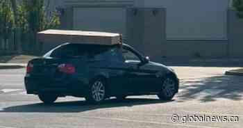 Caught on video: Alleged B.C. thieves balance TV box on top of getaway car