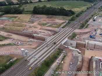 Time-lapse footage shows HS2 bridge being slid in underneath existing railway
