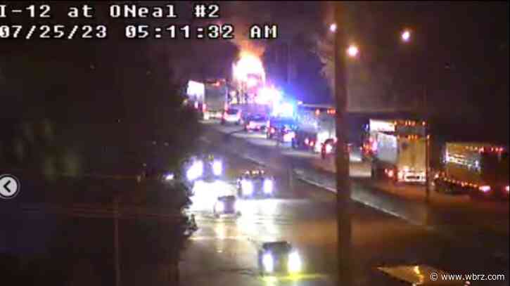 Tractor trailer catches on fire early Tuesday morning, leaves I-12 east partially blocked