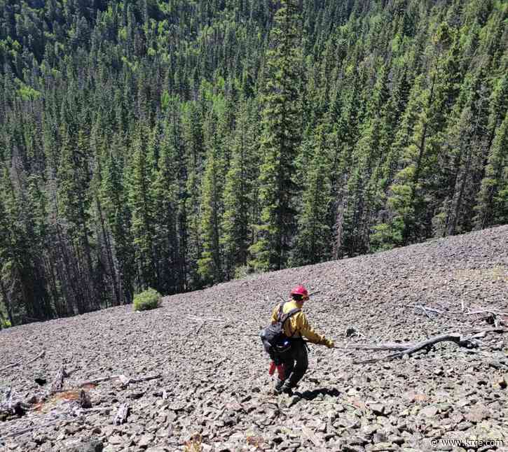 Fire crews monitor smoldering wildfire in Carson National Forest