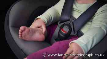 When can my child sit in a car front seat with a booster?