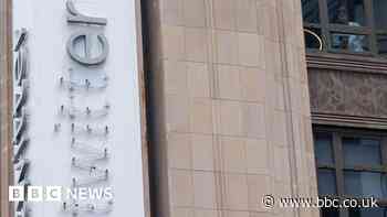 Twitter headquarters left with half a sign as police interrupt