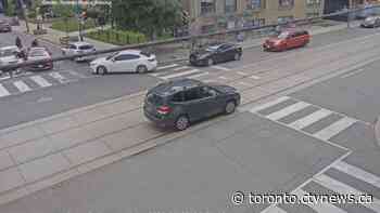 Teenage driver arrested after bike cop struck by fleeing stolen car in Toronto