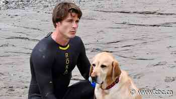 #TheMoment a blind man finished an epic swim for a good cause