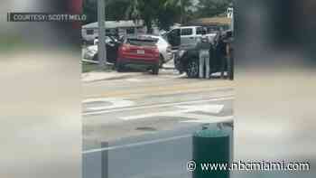 Video shows tense moments officers surround bank robbery suspect in Miami Gardens