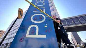 Handprints, slogans painted on Winnipeg police HQ after protesters say landfill search supporter arrested