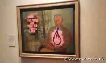 Eco-zealots graffiti King Charles III portrait and claim 'the world is on fire'