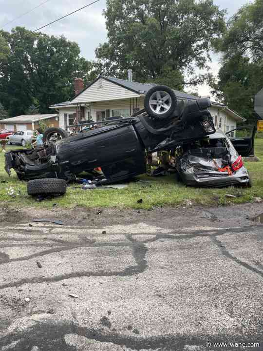Crash south of Garrett leaves truck on top of car, sends 2 to hospital
