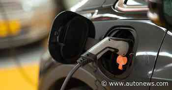 In challenge to Tesla, major automakers launch EV charging network