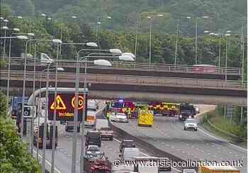 M25 traffic: Concern for welfare of woman and crash shuts road