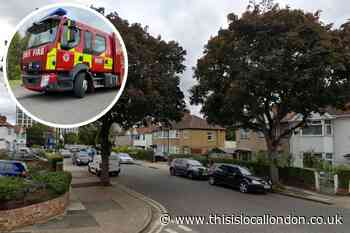 Flooding submerges gardens in Tokynton Avenue, Wembley