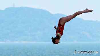 #TheMoment Canadians make history with high diving medals