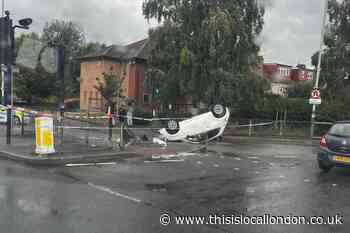 Man injured after car overturns at Roneo Corner, Romford
