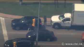 Video shows driver thrown from moving SUV after 'violent carjacking': police