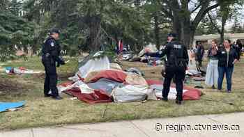 Regina police clear city hall encampment, 11 arrests made