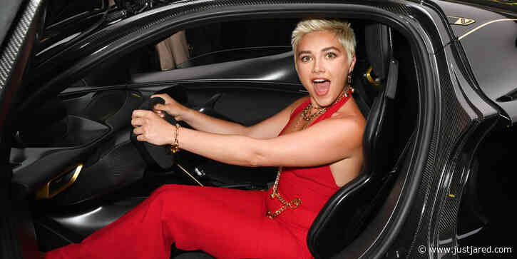 Florence Pugh Goes Fierce In Red Jumpsuit For Lotus Cars Launch in London