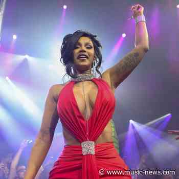Cardi B throws microphone at fan who tossed drink at her