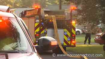 Neighbor and police officer help rescue woman from Wethersfield house fire