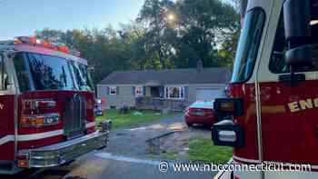 Neighbor, police officer and firefighter help rescue woman from Wethersfield house fire