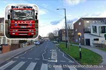 Woman saved from Enfield flat fire by firefighters