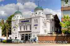 Charity under inquiry reopens after settling insurance issue