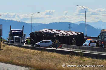 Semi-truck rolls into barricade and slows traffic near Mission Bridge