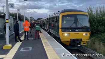 PASSENGERS GATHER AT PORTWAY PARK & RIDE TO GREET FIRST TRAIN