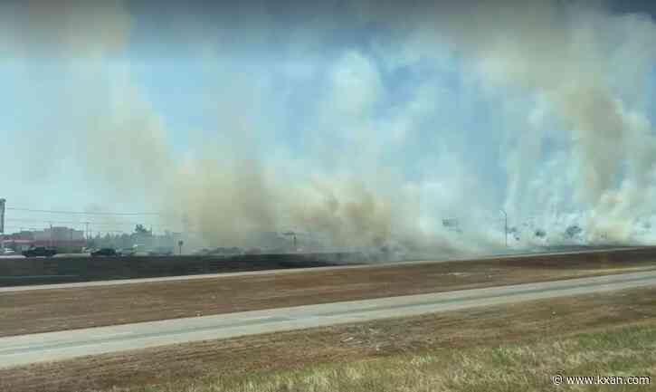 Grass fires close portion of SH 130 in Pflugerville