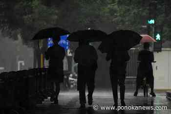 Beijing records heaviest rainfall in at least 140 years, causing severe flooding and 21 deaths