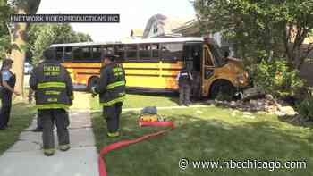At least 1 injured after school bus plows through Portage Park home
