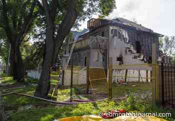 Edmonton firefighters battle blaze at downtown home