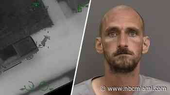 Armed suspect takes victim hostage after carjacking, aims weapons at Florida officers