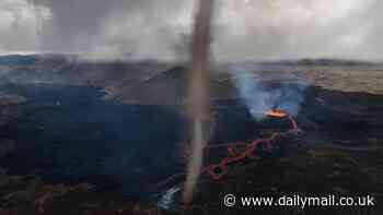 Watch the moment a 'TORNADO' explodes out of Iceland's newest volcano