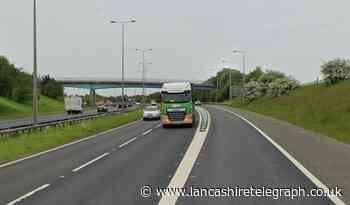 Lane closure after lorry and car crash on M65 near Blackburn
