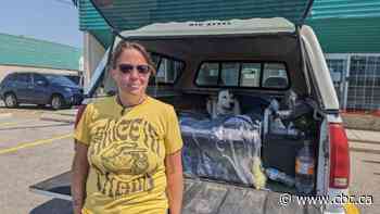 Calgary woman says cost of renting with a pet forced her to live in her truck