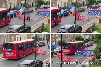 Sandhurst Road Catford: Bus drives down closed road