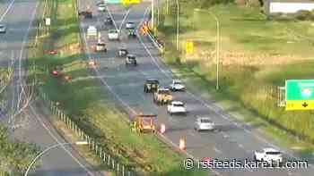 Highway worker hit by flying barrel from vehicle