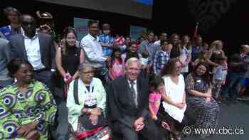 Citizenship ceremony at Folklorama opening