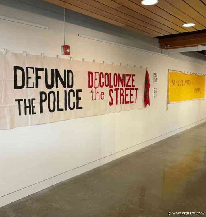 Oregon Gallery Removes Indigenous Artist’s Banner Critiquing Police, Spurring Allegations of Censorship 